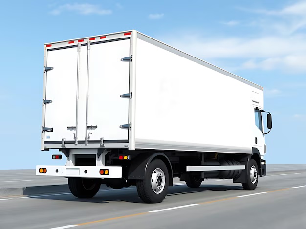 White box truck on an open road